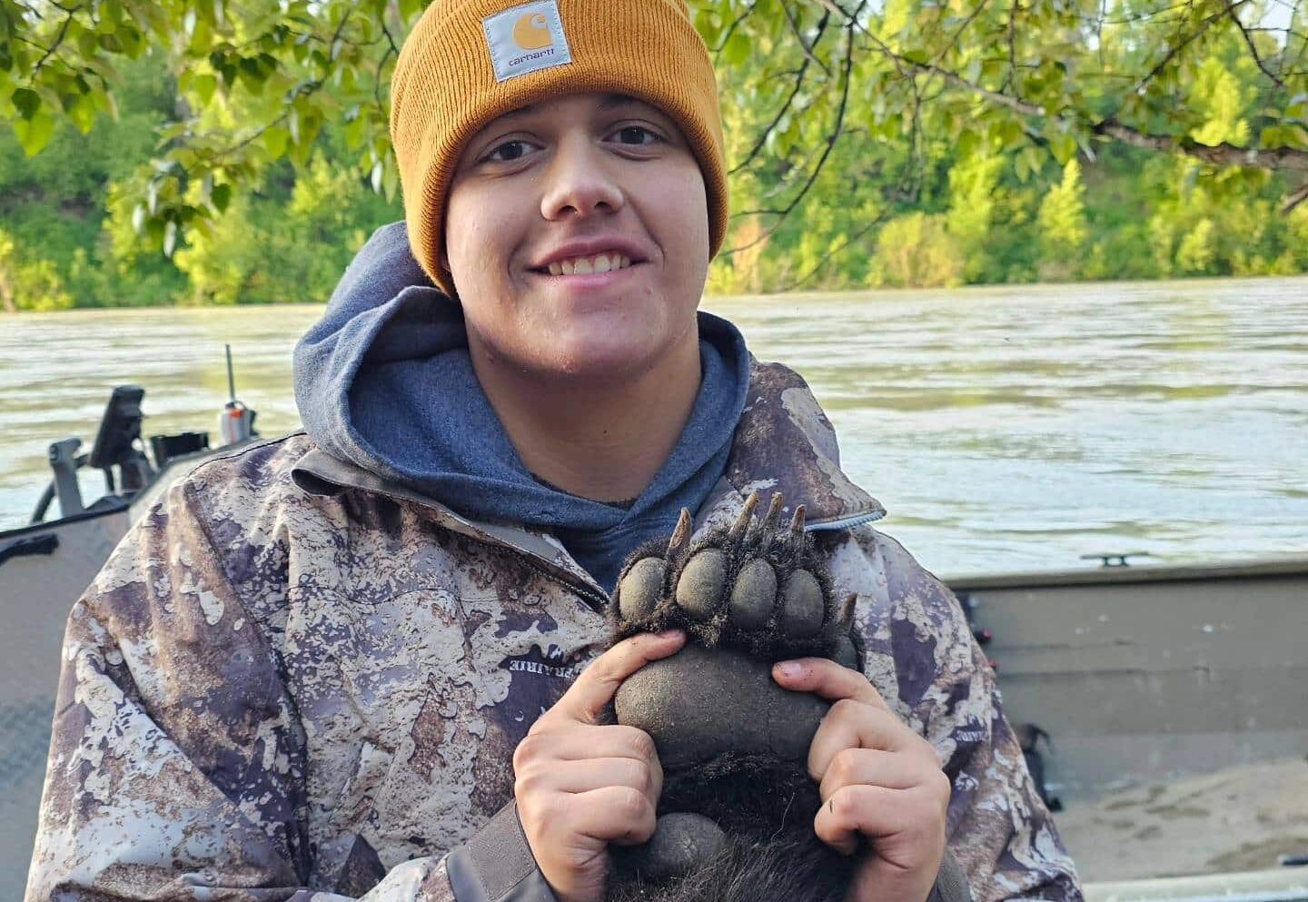 hunter showing bear paw