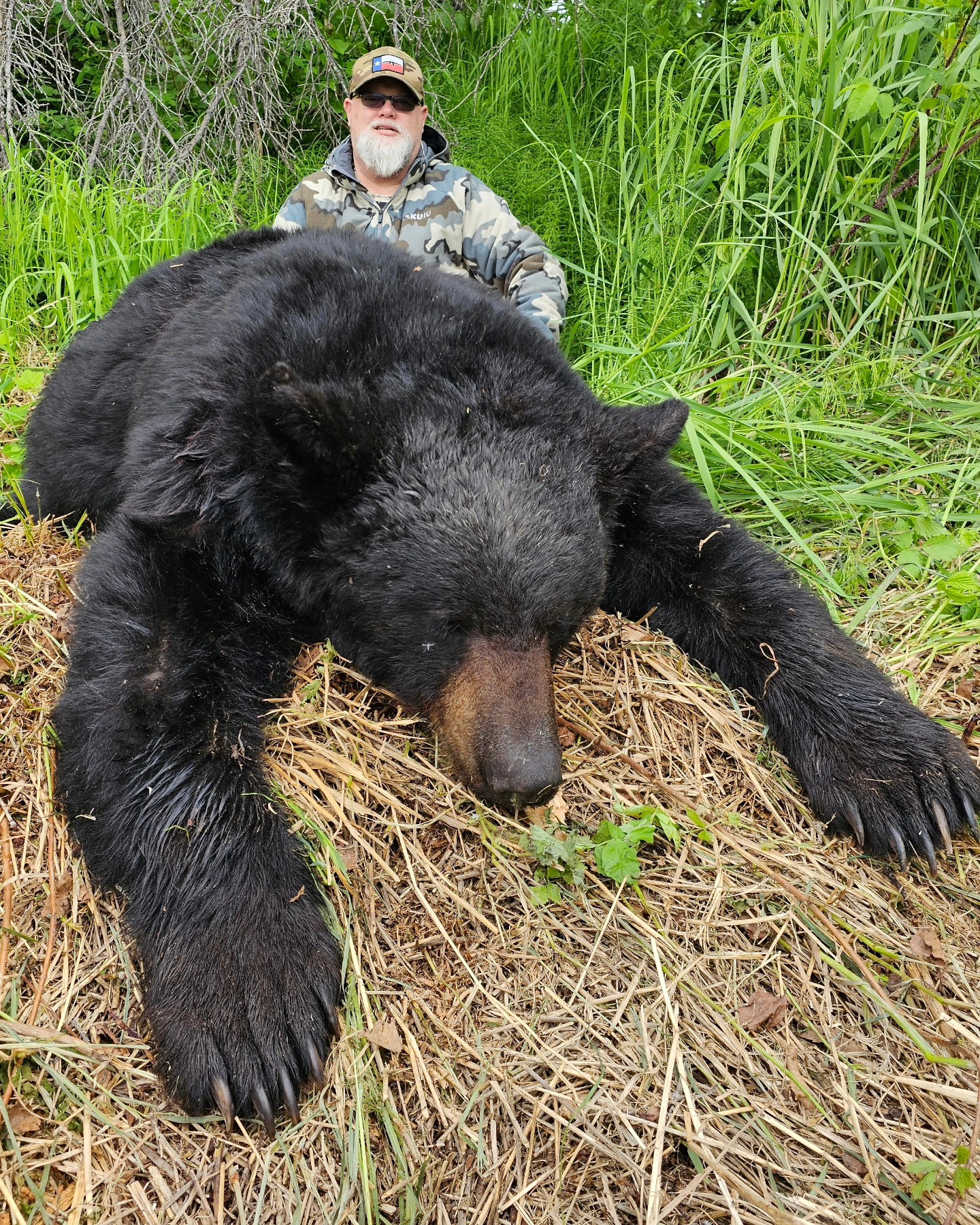 hunter with black bear