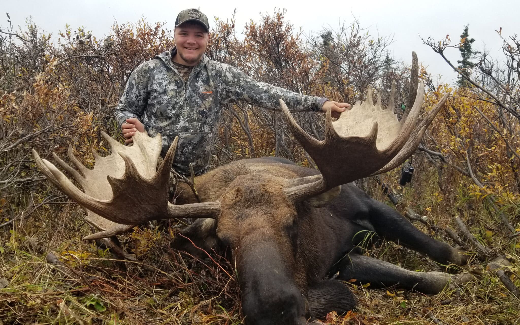 hunter and moose in Alaska